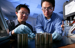 Dr. Tae Kim and Ph.D. student Shawn Lee conducting battery joining experiments.